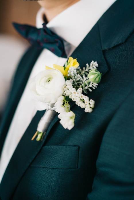 Ranunculus and pieris boutonniere}